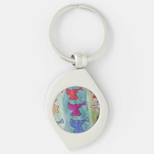 kerstangels met een metalen sleutelhanger