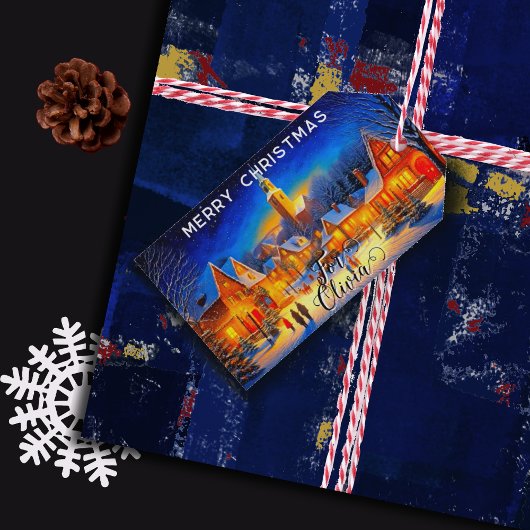 Kerstavond in een verlicht dorp cadeaulabel