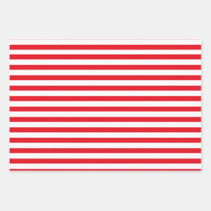 Kerstavond met snoepriet, rood en wit inpakpapier vel