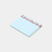 Kerstballen en karolvogels op lichtblauw post-it® notes (Schuin)