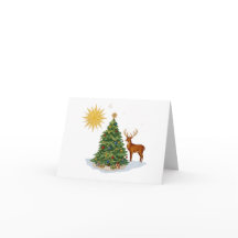 Kerstboom met rendiercadeaus en gouden ster