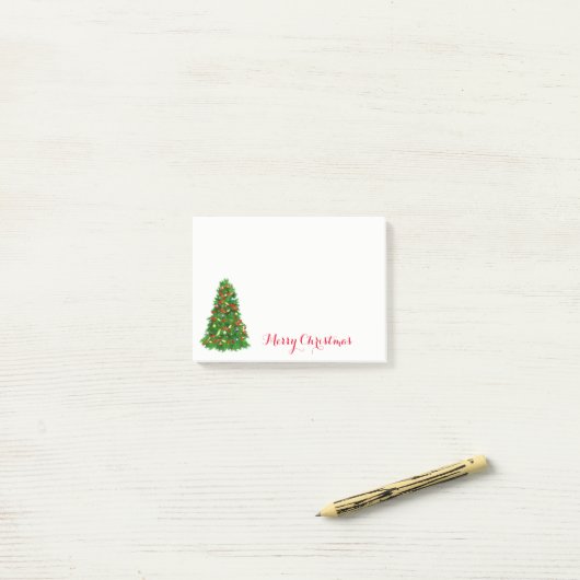 Kerstboom na de opmerkingen post-it® notes (Op bureau)
