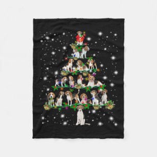 Kerstboom rond de beugel, bedekt door vlieglicht fleece deken