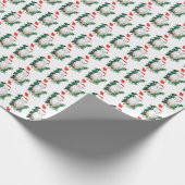 kerstboomkous houdt op met groot wild cadeaupapier (Hoek)