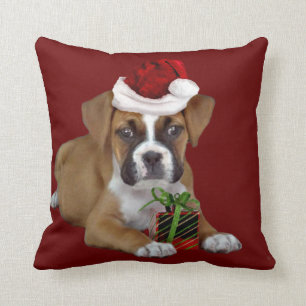 Kerstboxer Dog gooit kussens