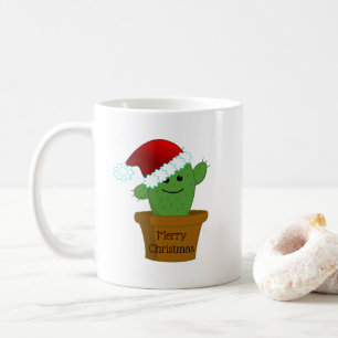 Kerstcactus in een kerstmuts koffiemok