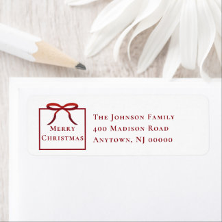 Kerstcadeau retouradres met rode strik etiket