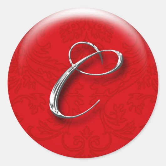 kerstcadeau sticker rood monogram (Voorkant)