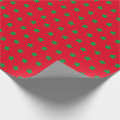 kerstcadeau voor rode groene sterren cadeaupapier (Hoek)