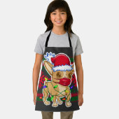 Kerstchihuahua met een medisch masker schort (Insitu)