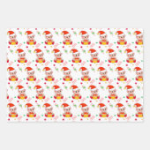 Kerstelf, snoepstok, confetti op groen en rood inpakpapier vel (Voorkant)