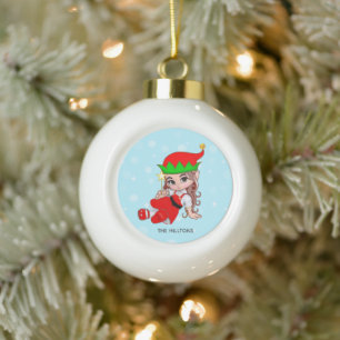Kerstelfje met een ster keramische bal ornament
