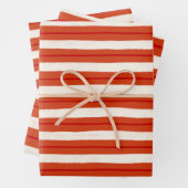 Kerstfeeststrepen, getextureerd in rood en wit inpakpapier vel (In situ)