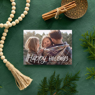Kerstfoto met handgeschreven speeltekst feestdagenkaart