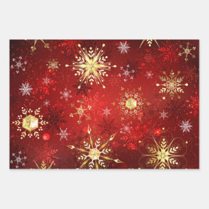 Kerstgouden sneeuwvlokken op rode achtergrond inpakpapier vel
