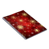 Kerstgouden sneeuwvlokken op rode achtergrond notitieboek (Rechterzijde)