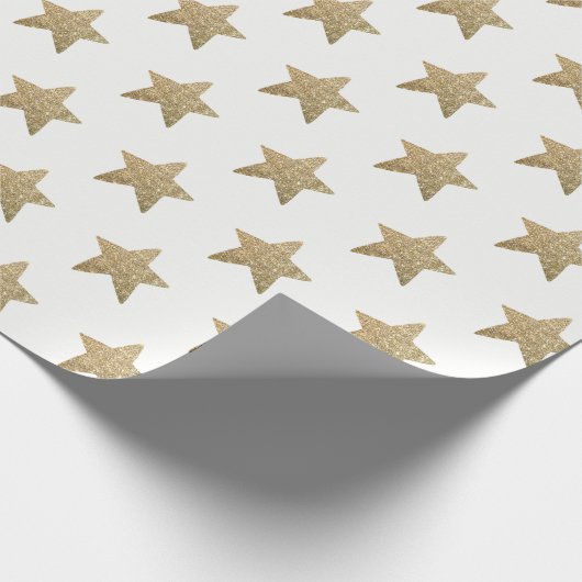 Kerstgoudstars met cadeaupapier voor kerstcadeautj (Hoek)
