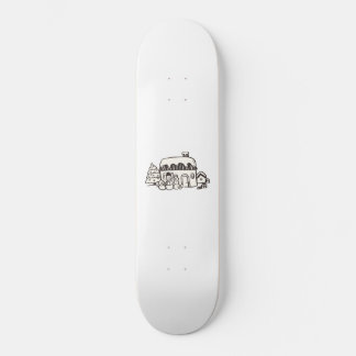 Kersthuis met sneeuwpop skateboard