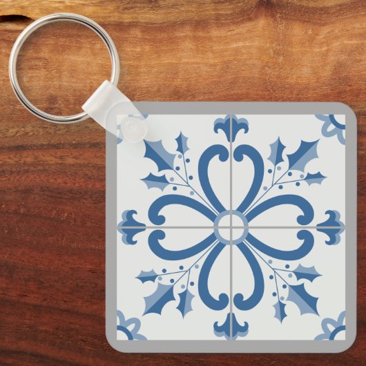 Kersthulst en bloemblaadjes blauwe tegel sleutelhanger (Voorkant)