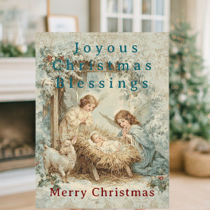 Kerstkaart met baby Jezus in een kribbe en engel Briefkaart