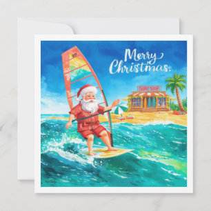 Kerstkaart met Kerstman op de surfplank op het str