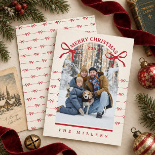 Kerstkaart met vintage rode strikken en foto kaart