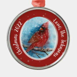 Kerstkardinale sneeuwvlokken op rood of blauw metalen ornament