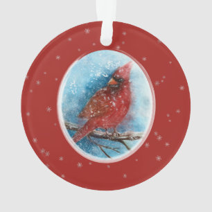 Kerstkardinale sneeuwvlokken op rood of blauw ornament
