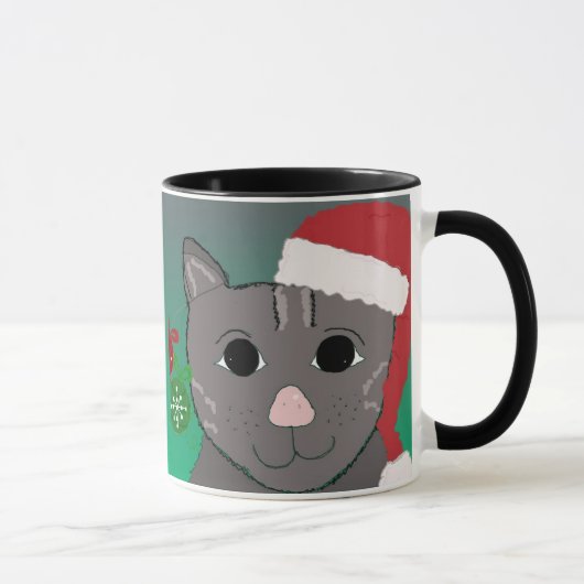 Kerstkat in een rode kersthat mok (Rechts)