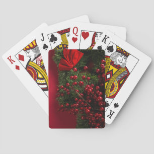 kerstkrans met rode bessen pokerkaarten