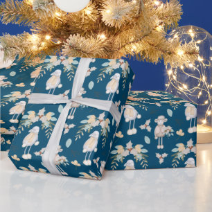Kerstlammeren op blauw cadeaupapier