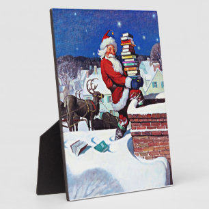 Kerstman brengt boeken op kerstavond fotoplaat