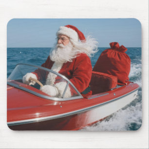 Kerstman die cadeaus bezorgt per speedboot muismat