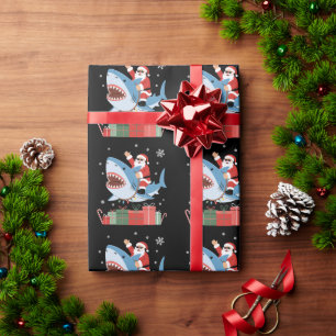 Kerstman die op haai rijdt Kerstmis pyjama Schatti Cadeaupapier