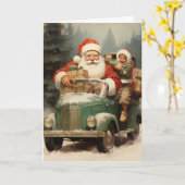 Kerstman en Kind in een kleine groene auto met ges Kaart (Gele Bloem)