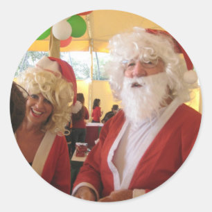 Kerstman en mevrouw Claus Kerstviering - Feestelij Ronde Sticker