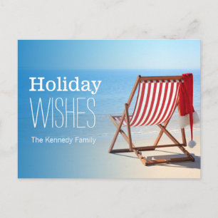 Kerstman hoed op een ligstoel. Kerst op de Feestdagenkaart