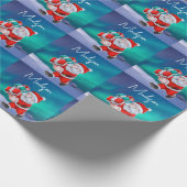 Kerstman is onderweg naar het noorderlicht kerst cadeaupapier (Hoek)