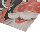 Kerstman met Herinneringsstring op Vinger Snijplank (Hoek)