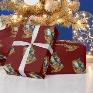 kerstman met kerst-rood cadeaupapier