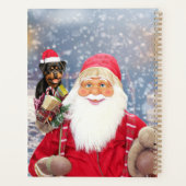 Kerstman met kerstcadeaus rottweiler hond planner (Achterkant)