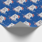 Kerstman met kerstpapier met kerstcadeautje cadeaupapier (Hoek)