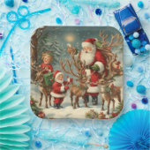  kerstman met kinderen, rendieren en geschenken papieren bordje (Feest)