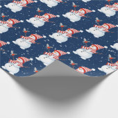 Kerstman met vogel op blauw cadeaupapier (Hoek)