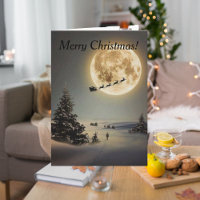 kerstman met volle maan vliegend rendier