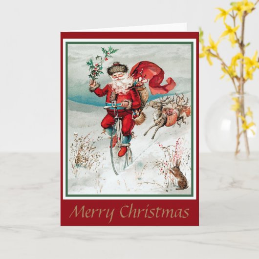 Kerstman op fiets met hert en konijn kaart (Gele Bloem)