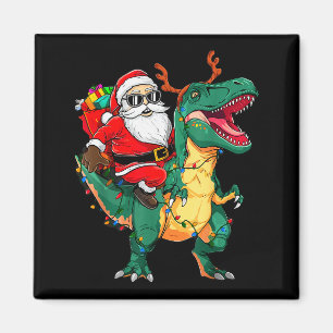 Kerstman rijdt op dinosaurus T Rex Grappige Kerst Magneet
