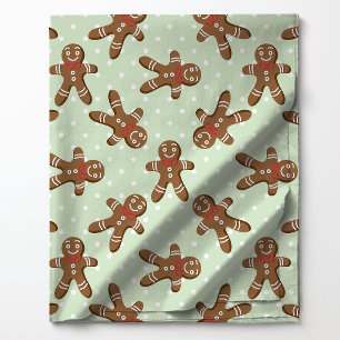 Kerstman van gemberkoek met polkadots op lichtgroe stof