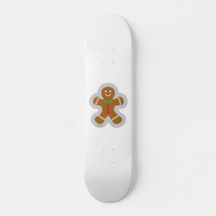 Kerstmannetje maakt engel in de sneeuw skateboard