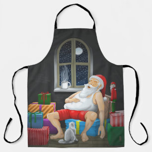 Kerstmannetje pauzeert even om koffie te drinken schort